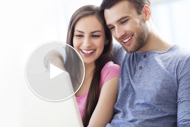 two people looking at computer screen